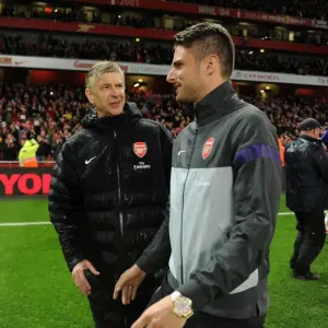 Arsene Wenger the Arsenal Manager with Olivier Giroud (Arsenal) during the lap of