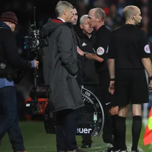 Arsene Wenger the Arsenal Manager and Referee Mike Dean. West Bromwich Albion 1: 1 Arsenal