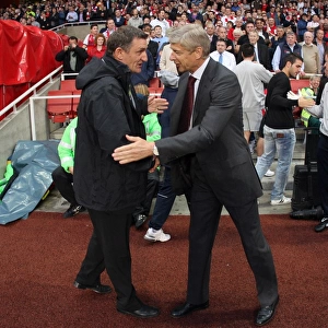 Arsene Wenger the Arsenal Manager shakes hands with