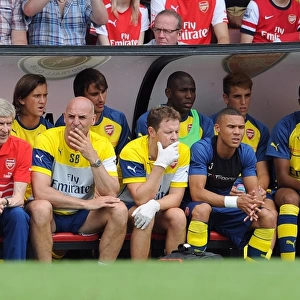 Arsene Wenger the Arsenal Manager and Steve Bould the Assistant Manager in the dug out