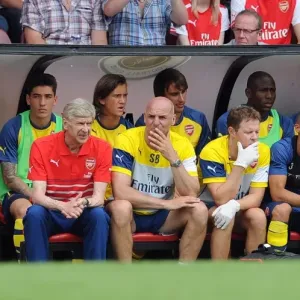 Arsene Wenger the Arsenal Manager and Steve Bould the Assistant Manager in the dug out