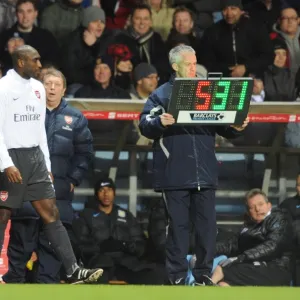 Arsene Wenger the Arsenal Manager with sub Sol Campbell (Arsenal). Aston Villa 0