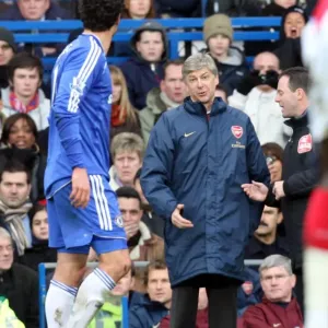 Arsene Wenger the Arsenal Manager talks to Michael Ballack (Chelsea)