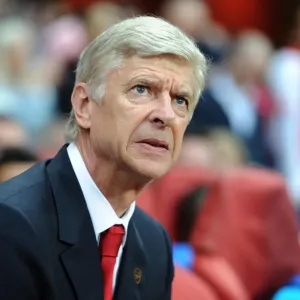 Arsene Wenger: Arsenal Manager in UEFA Champions League Showdown Against Besiktas (2014)
