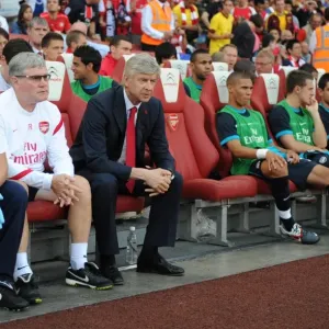 Arsene Wenger with Assistants Pat Rice and Colin Lewin during Arsenal's Emirates Cup Match against Boca Juniors (2011-12) Arsene Wenger with Assistants Pat Rice and Colin Lewin during Arsenal's Emirates Cup Match against Boca Juniors (2011-12)