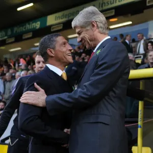 Arsene Wenger and Chris Hughton Before Norwich City vs Arsenal (2012-13) Arsene Wenger and Chris Hughton Before Norwich City vs Arsenal (2012-13)