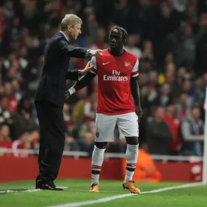 Arsene Wenger Conferring with Bacary Sagna during Arsenal vs Napoli, UEFA Champions League (2013) Arsene Wenger Conferring with Bacary Sagna during Arsenal vs Napoli, UEFA Champions League (2013)