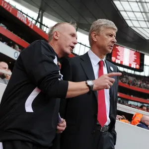 Arsene Wenger Conferring with Fourth Official Peter Walton at Arsenal vs. Sunderland (2011-12)