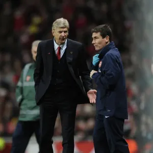 Arsene Wenger and Doctor Gary O'Driscoll during Arsenal vs Liverpool, 2013-14 Premier League Arsene Wenger and Doctor Gary O'Driscoll during Arsenal vs Liverpool, 2013-14 Premier League