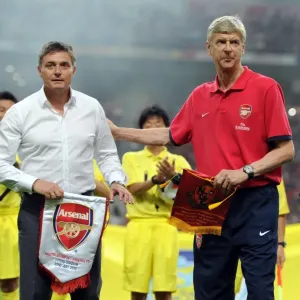 Arsene Wenger and Dragan Stojkovic Exchange Pennants Before Nagoya Grampus vs. Arsenal Match, 2013