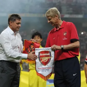 Arsene Wenger and Dragan Stojkovic Exchange Pennants during Nagoya Grampus vs. Arsenal Match, 2013