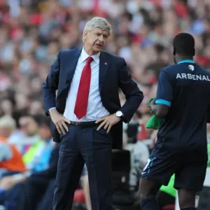 Arsene Wenger with Emmanuel Eboue at Arsenal v Boca Juniors, Emirates Cup 2011 Arsene Wenger with Emmanuel Eboue at Arsenal v Boca Juniors, Emirates Cup 2011