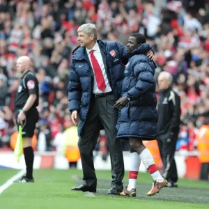 Arsene Wenger and Emmanuel Eboue Celebrate Arsenal's Win against Wolverhampton Wanderers, FA Premier League, 2010