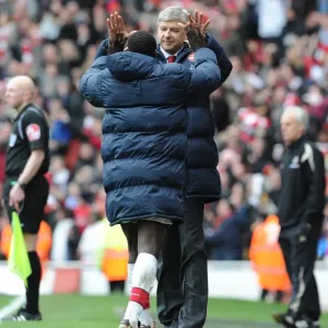 Arsene Wenger and Emmanuel Eboue: Celebrating Arsenal's Victory Against Wolverhampton Wanderers, FA Premier League, 2010