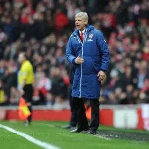 Arsene Wenger Faces Off Against Liverpool in Premier League Showdown (2014-15)