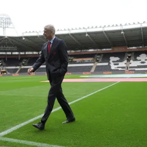 Arsene Wenger: Focused at the Helm of Arsenal against Hull City, 2016-17