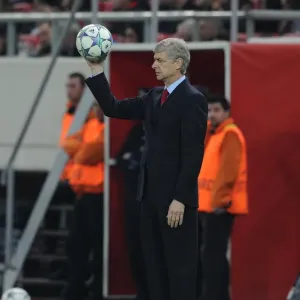 Arsene Wenger: Focused at Olympiacos vs Arsenal, UEFA Champions League (December 2011)