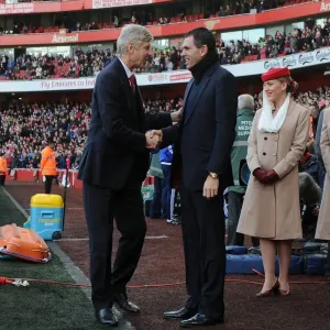 Arsene Wenger and Gus Poyet: Pre-Match Handshake at Arsenal vs Sunderland (2014, Premier League) Arsene Wenger and Gus Poyet: Pre-Match Handshake at Arsenal vs Sunderland (2014, Premier League)