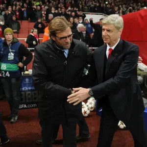 Arsene Wenger and Jurgen Klopp: A Pre-Match Encounter Between Arsenal and Borussia Dortmund in the UEFA Champions League (2014)