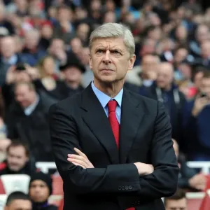 Arsene Wenger Leading Arsenal Against Tottenham Hotspur in the Premier League (2012-13) Arsene Wenger Leading Arsenal Against Tottenham Hotspur in the Premier League (2012-13)