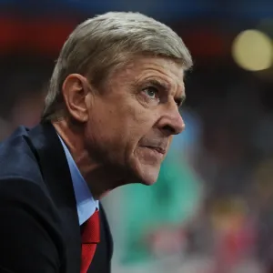Arsene Wenger Leads Arsenal in the 2013-14 Champions League Match Against Napoli Arsene Wenger Leads Arsenal in the 2013-14 Champions League Match Against Napoli