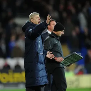 Arsene Wenger Leads Arsenal Against Cardiff City in the 2013-14 Premier League