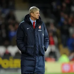 Arsene Wenger Leads Arsenal Against Cardiff City in the 2013-14 Premier League