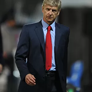 Arsene Wenger Leads Arsenal in Champions League Showdown against Olympique Marseille (2013-14)