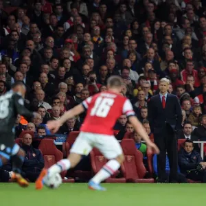 Arsene Wenger Leads Arsenal in Champions League Showdown Against Napoli (2013-14) Arsene Wenger Leads Arsenal in Champions League Showdown Against Napoli (2013-14)