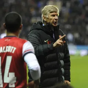 Arsene Wenger Leads Arsenal in Intense Capital One Cup Battle against Reading