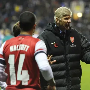 Arsene Wenger Leads Arsenal in Intense Capital One Cup Battle against Reading