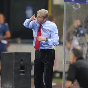 Arsene Wenger Leads Arsenal in UEFA Champions League Clash against Udinese Calcio (2011) Arsene Wenger Leads Arsenal in UEFA Champions League Clash against Udinese Calcio (2011)