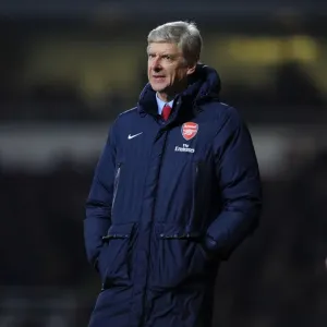 Arsene Wenger Leads Arsenal Against West Ham United in Premier League Clash (December 2013)