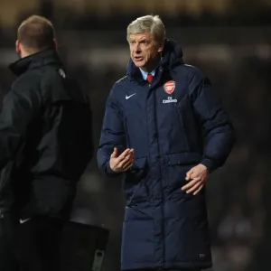 Arsene Wenger Leads Arsenal Against West Ham United in Premier League Clash (December 2013)