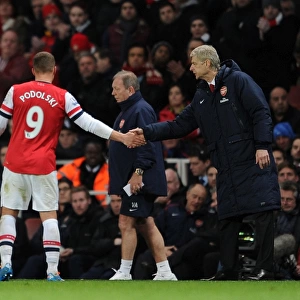 Arsene Wenger and Lukas Podolski: A Handshake at Emirates Stadium (Arsenal vs Crystal Palace, 2013-14)