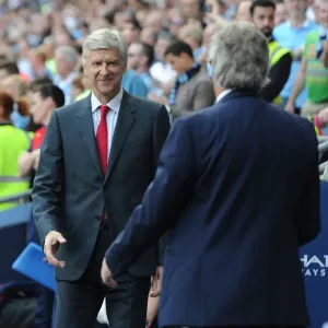 Arsene Wenger and Manuel Pellegrini's Pre-Match Handshake: Manchester City vs. Arsenal, Premier League 2015-16 Arsene Wenger and Manuel Pellegrini's Pre-Match Handshake: Manchester City vs. Arsenal, Premier League 2015-16
