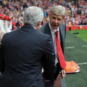 Arsene Wenger and Mark Hughes: Pre-Match Handshake at Arsenal vs Stoke City (2013-14) Arsene Wenger and Mark Hughes: Pre-Match Handshake at Arsenal vs Stoke City (2013-14)
