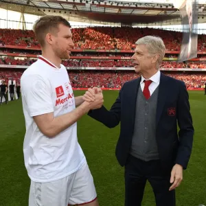 Arsene Wenger and Per Mertesacker: A Farewell Handshake (Arsenal v Burnley, 2018) Arsene Wenger and Per Mertesacker: A Farewell Handshake (Arsenal v Burnley, 2018)