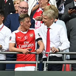 Arsene Wenger and Mesut Ozil Celebrate Arsenal's FA Cup Victory over Chelsea
