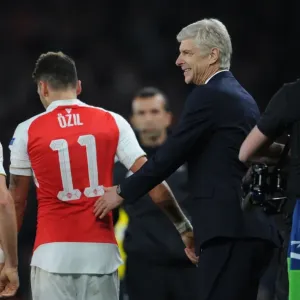 Arsene Wenger and Mesut Ozil: Celebrating Arsenal's Goal Against Bayern Munich in the 2015 Champions League Arsene Wenger and Mesut Ozil: Celebrating Arsenal's Goal Against Bayern Munich in the 2015 Champions League