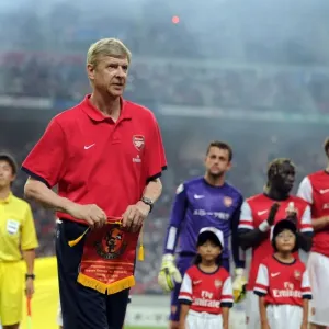 Arsene Wenger with Nagoya Grampus Pennant before Arsenal's 2013 Pre-season Match
