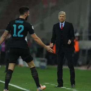 Arsene Wenger and Olivier Giroud: Celebrating Arsenal's Third Goal Against Olympiacos in the Champions League (December 2015) Arsene Wenger and Olivier Giroud: Celebrating Arsenal's Third Goal Against Olympiacos in the Champions League (December 2015)