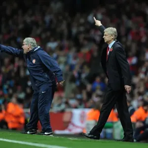 Arsene Wenger and Pat Rice Lead Arsenal FC in 2011-12 UEFA Champions League Clash against Olympique de Marseille Arsene Wenger and Pat Rice Lead Arsenal FC in 2011-12 UEFA Champions League Clash against Olympique de Marseille