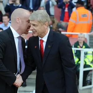 Arsene Wenger and Sean Dyche: A Pre-Match Encounter at Arsenal vs Burnley (2014/15) Arsene Wenger and Sean Dyche: A Pre-Match Encounter at Arsenal vs Burnley (2014/15)
