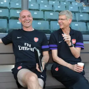 Arsene Wenger and Steve Bould: A Light-Hearted Moment Before Arsenal's Pre-Season Friendly against Kitchee (2012) Arsene Wenger and Steve Bould: A Light-Hearted Moment Before Arsenal's Pre-Season Friendly against Kitchee (2012)