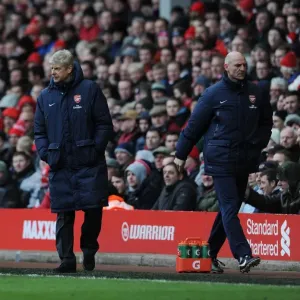 Arsene Wenger and Steve Bould at Liverpool's Anfield: Arsenal vs. Liverpool (2013-14) Arsene Wenger and Steve Bould at Liverpool's Anfield: Arsenal vs. Liverpool (2013-14)