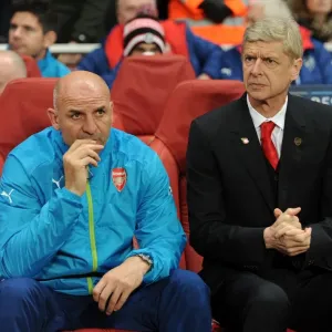 Arsene Wenger and Steve Bould: Pre-Match Huddle at Arsenal's Emirates Stadium (Arsenal v Anderlecht, 2014/15 Champions League) Arsene Wenger and Steve Bould: Pre-Match Huddle at Arsenal's Emirates Stadium (Arsenal v Anderlecht, 2014/15 Champions League)