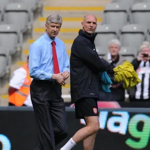 Arsene Wenger and Steve Bould: Pre-Match Huddle at St. James Park (Newcastle United vs. Arsenal, 2012-13) Arsene Wenger and Steve Bould: Pre-Match Huddle at St. James Park (Newcastle United vs. Arsenal, 2012-13)