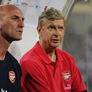 Arsene Wenger and Steve Bould: Preparing for Arsenal's Vietnam Friendly (2013) Arsene Wenger and Steve Bould: Preparing for Arsenal's Vietnam Friendly (2013)