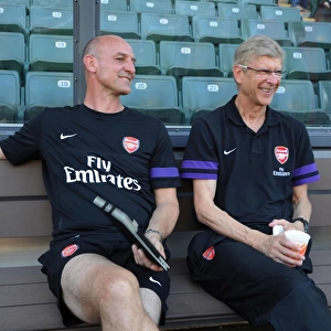Arsene Wenger and Steve Bould Share a Light-Hearted Moment Before Kitchee FC vs. Arsenal FC Match (2012)